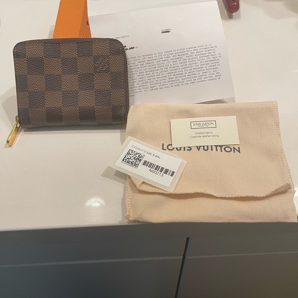 Louis Vuitton small zippy wallet